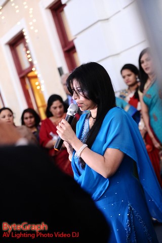 ConsulateRD_Aarti Pandya singing national anthems_320.jpg